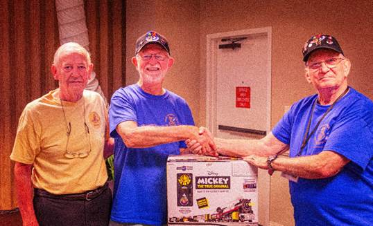 A few men shaking hands

Description automatically generated with medium confidence