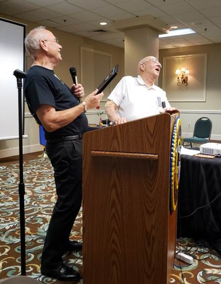 A picture containing indoor, wall, ceiling, person

Description automatically generated